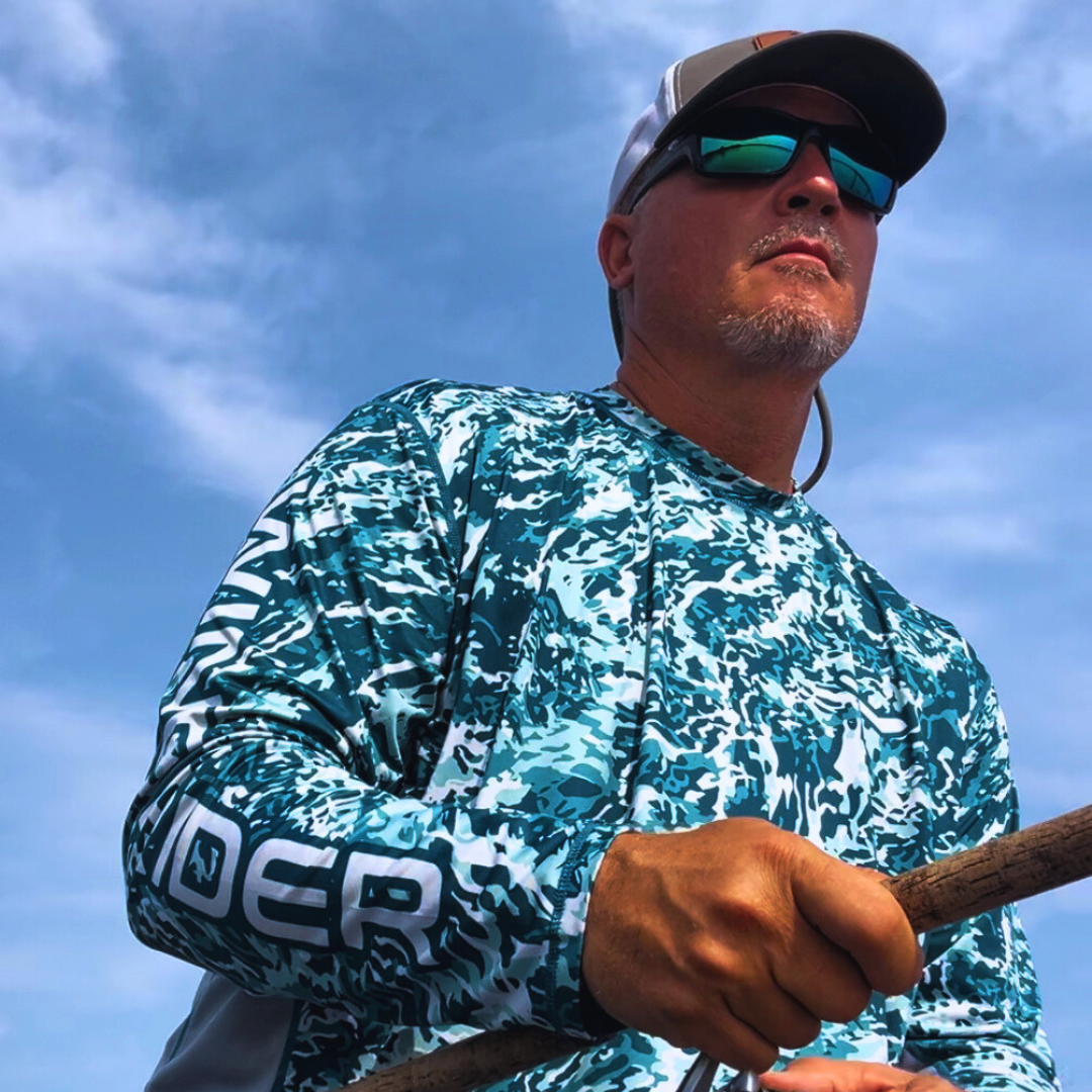 Front flat lay caribbean cove sol invictus pro shirt showing light blue mesh panel design