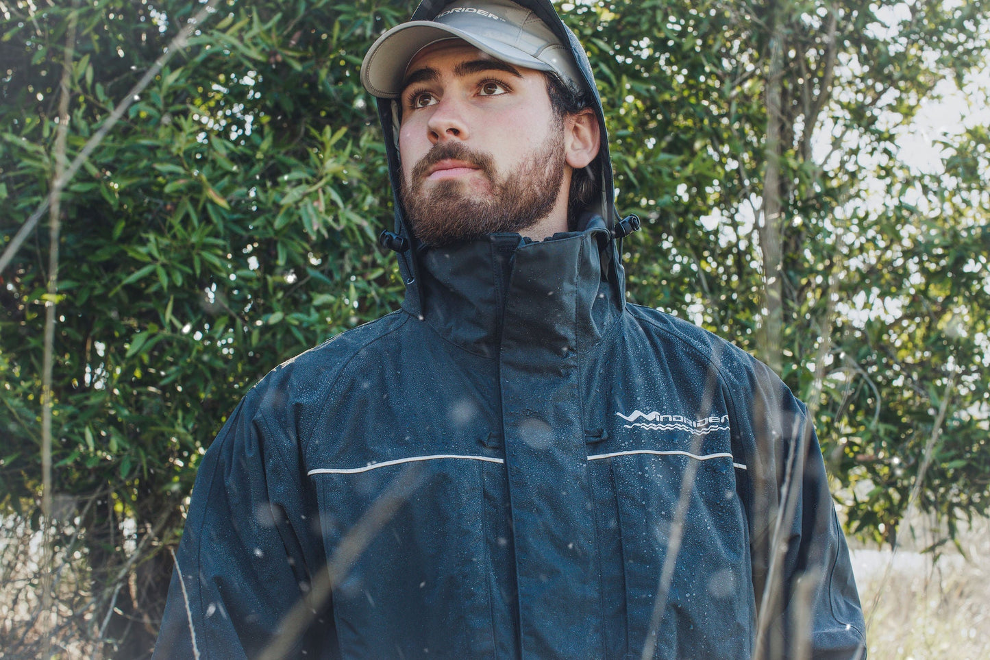 Detail view of waterproof rain gear jacket showing insulation and pocket features