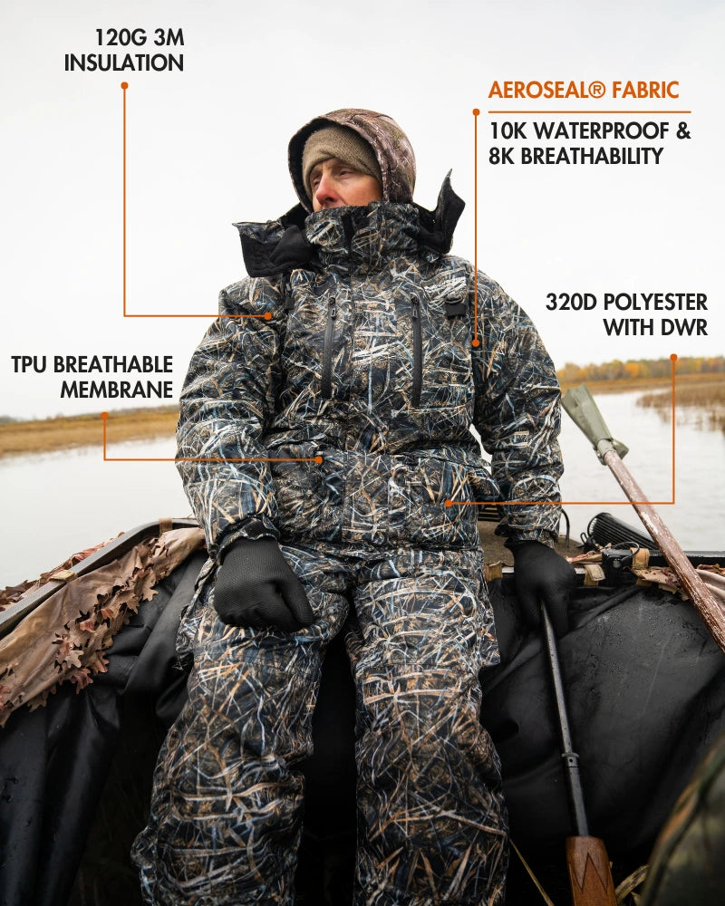 Side view of charcoal grey ice gear jacket and bibs showing multiple cargo pockets