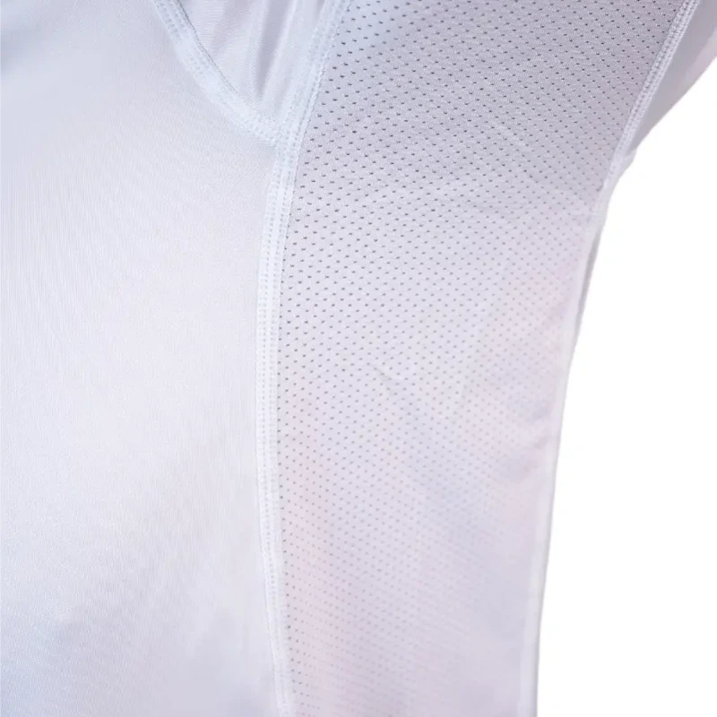 Detail of white shirt underarm showing ventilation mesh panels