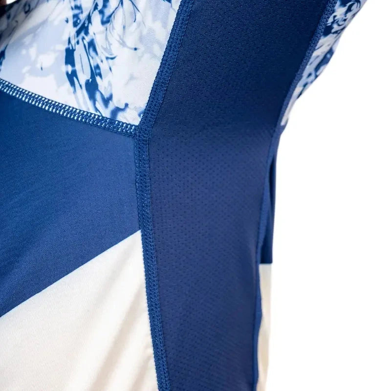 Detail shot of blue fabric flatlock stitching and seam construction