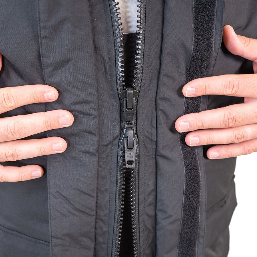 Detail of waterproof rain gear gear showing waterproof construction and features