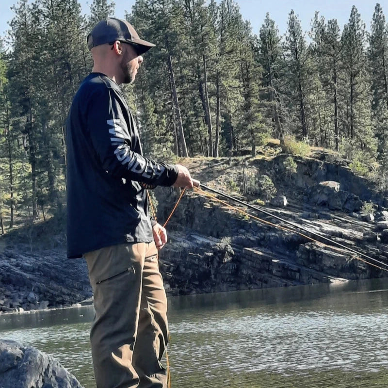 Macro detail of solid blue fabric showing UPF 50 sun protective material