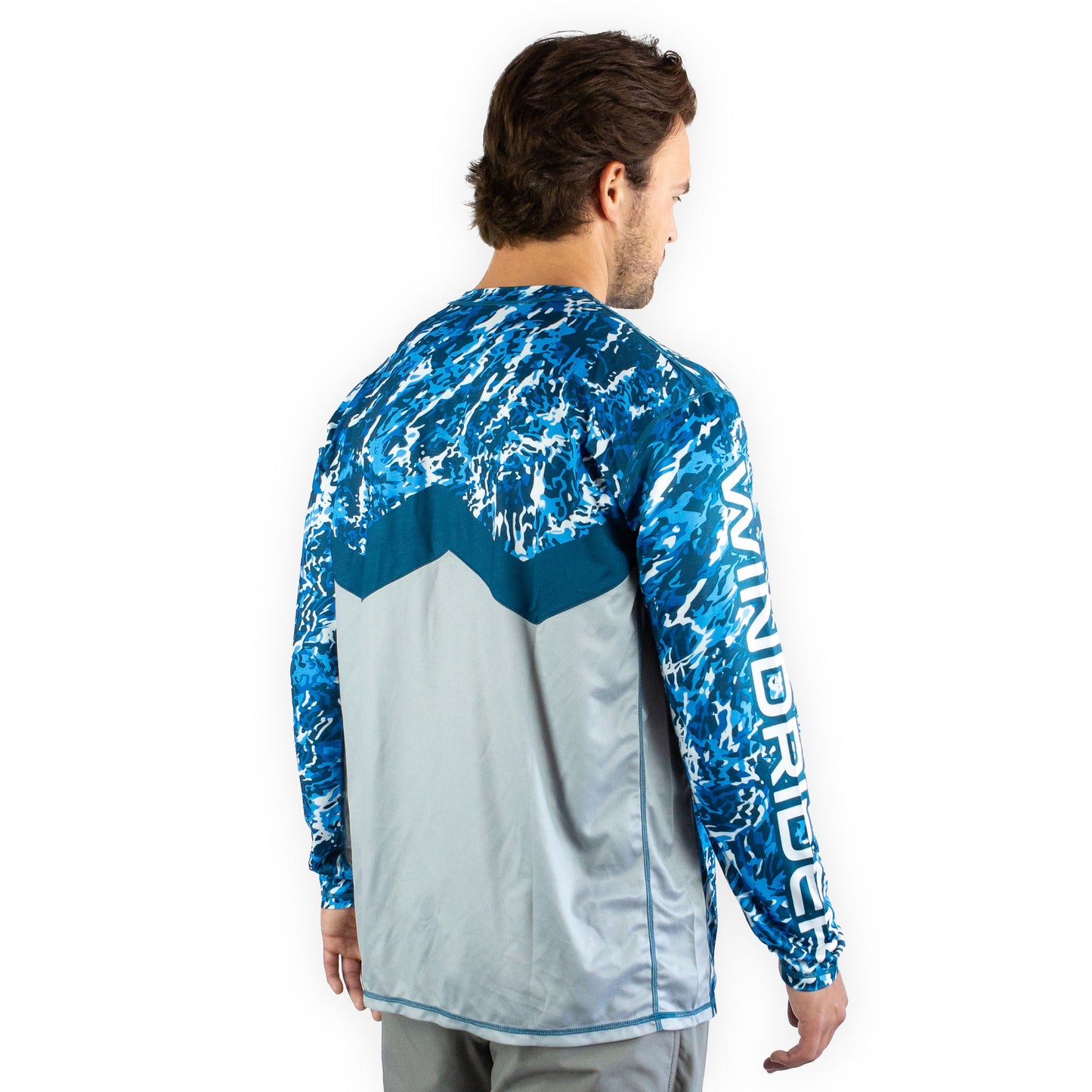 Man in blue camo sol invictus pro shirt three quarter view showing mesh side ventilation