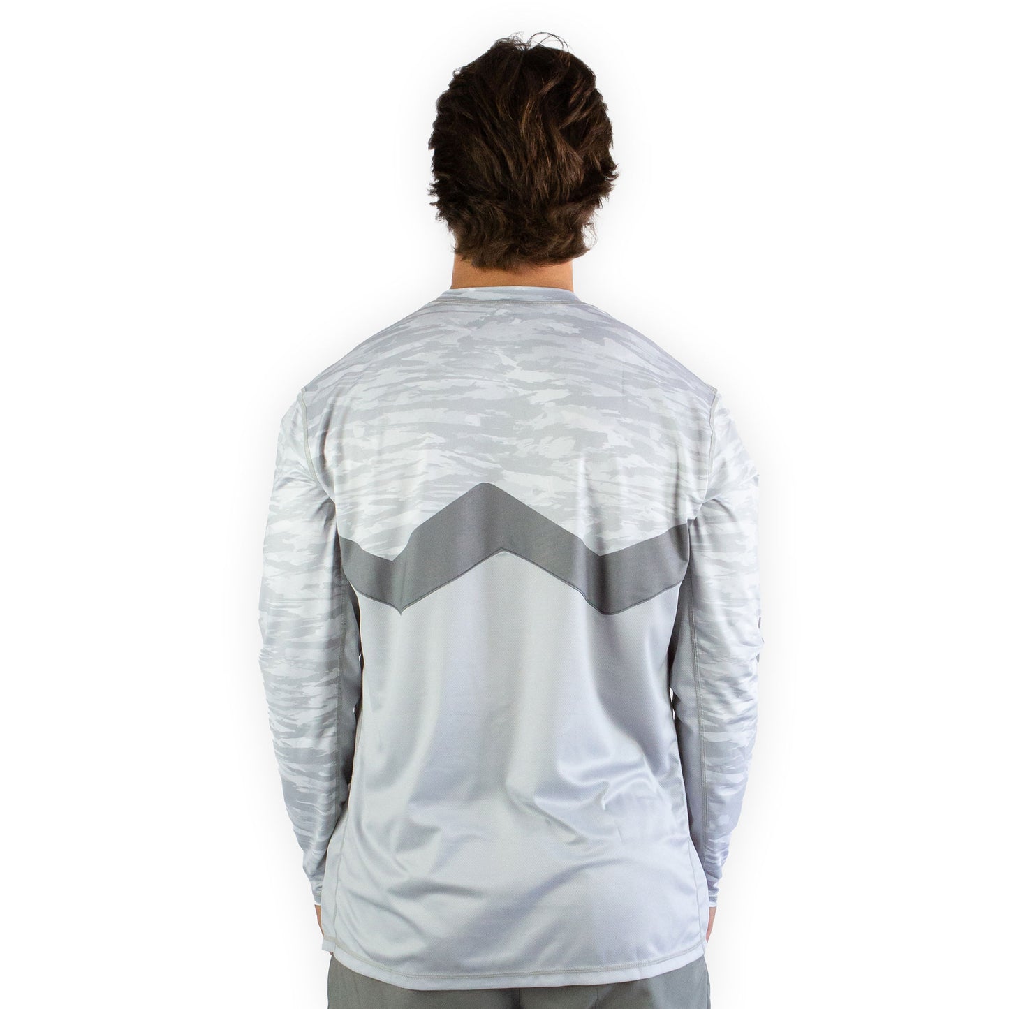 Man in white snowy tundra sol invictus pro shirt three quarter studio view showing fit