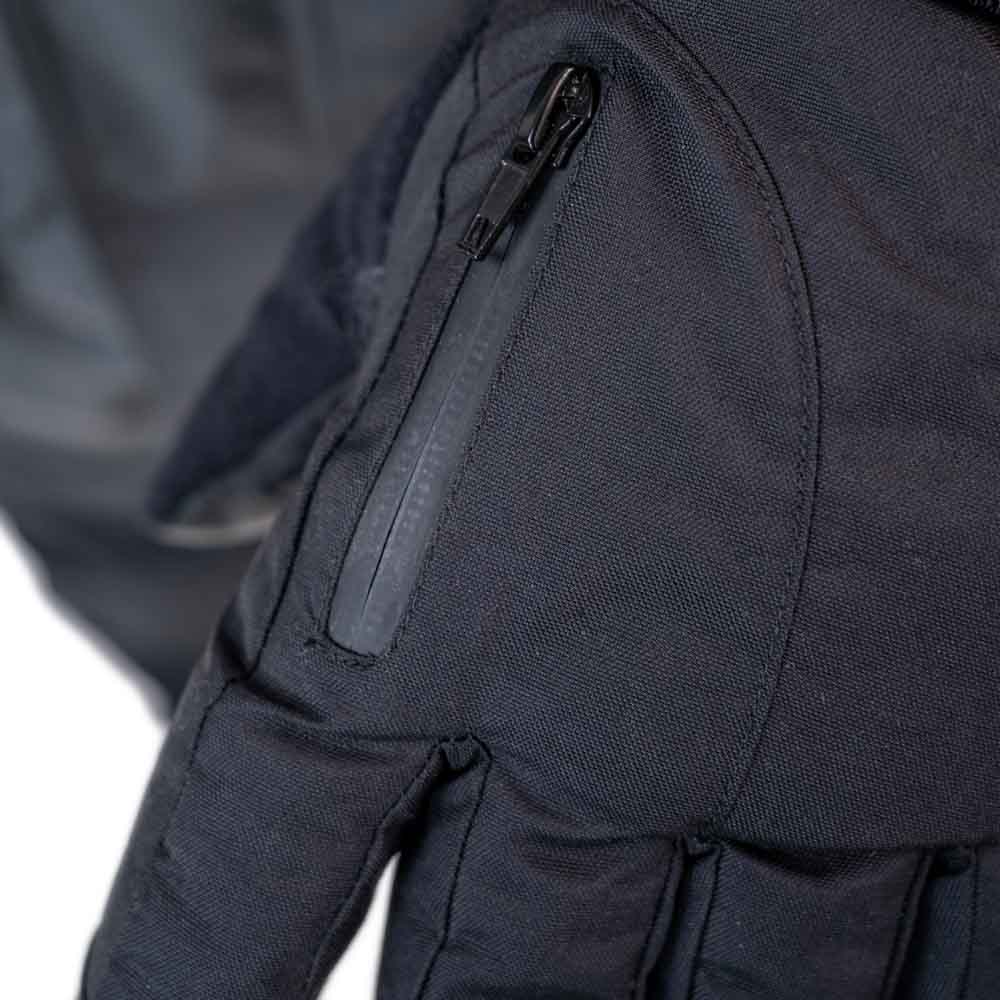 Detail view of insulated ice gear jacket showing insulation and pocket features