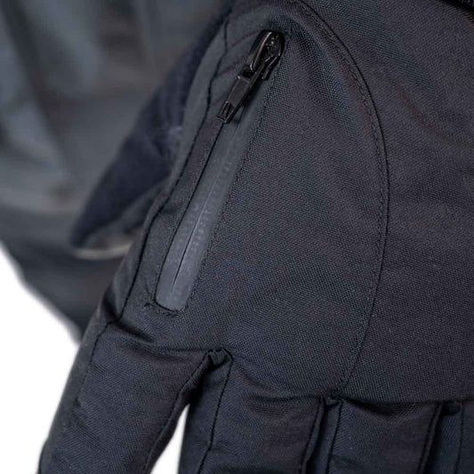 Detail view of insulated ice gear jacket showing insulation and pocket features