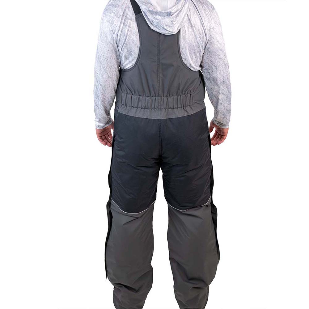 Detail view of grey and navy blue ice gear jacket showing insulation and pocket features