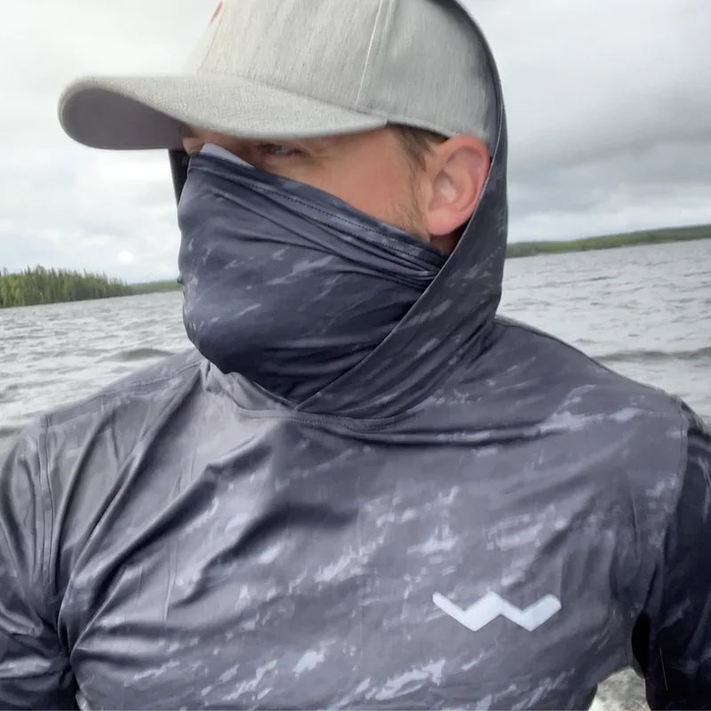 Helios fishing apparel - Fishing Vests Over UPF Shirts: Layering Guide for Maximum Protection