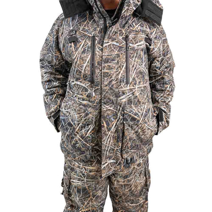 Side view of charcoal grey ice gear jacket and bibs showing multiple cargo pockets