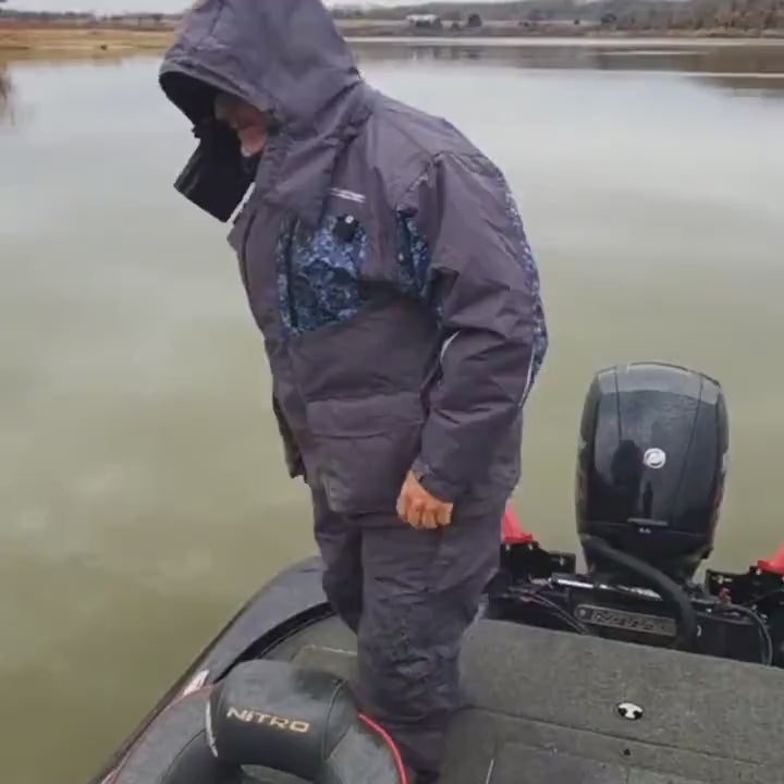 Person in float suit jumping into water