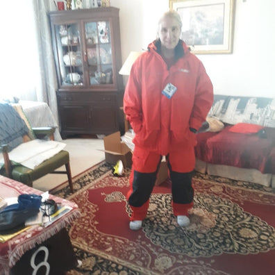Customer in the red jacket and bibs